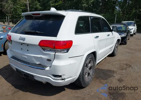 2014 Jeep Grand Cherokee Overland из США, поврежденный, VIN 1C4RJFCG7EC380766